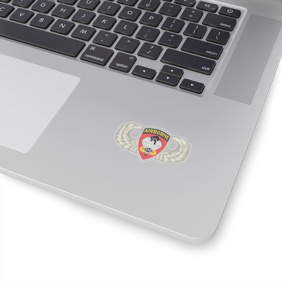 Laptop with an Airborne sticker on the palm rest area