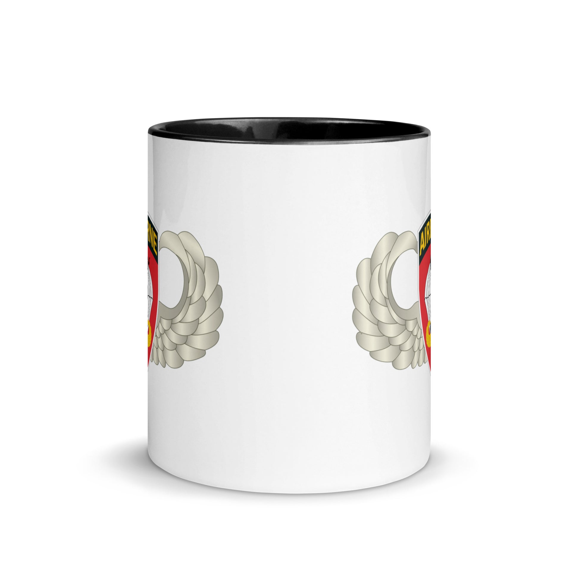  "Ceramic mug with black interior featuring 555th Parachute Infantry Battalion SSI, middle view"