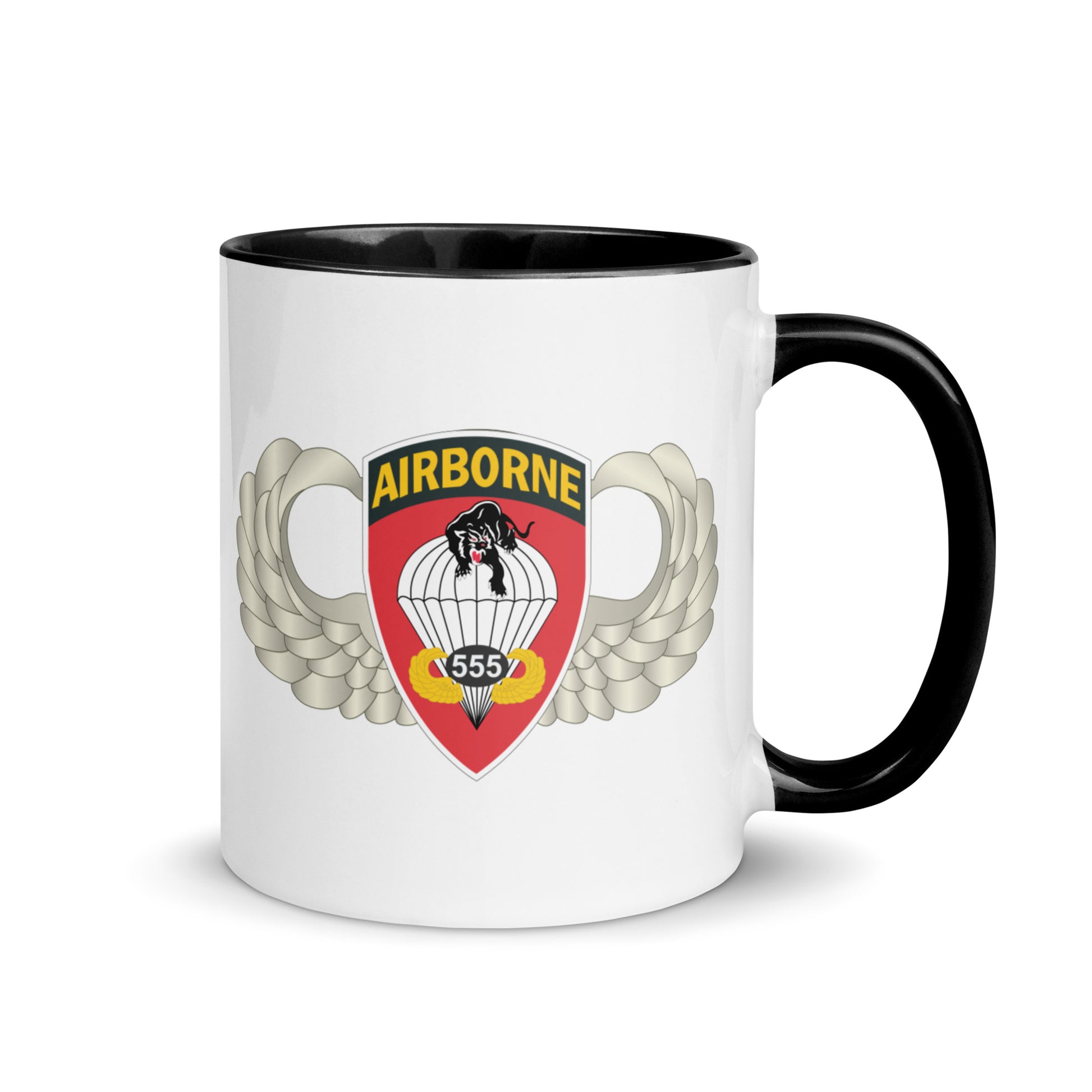  "Ceramic mug with black interior featuring 555th Parachute Infantry Battalion SSI, rear view"