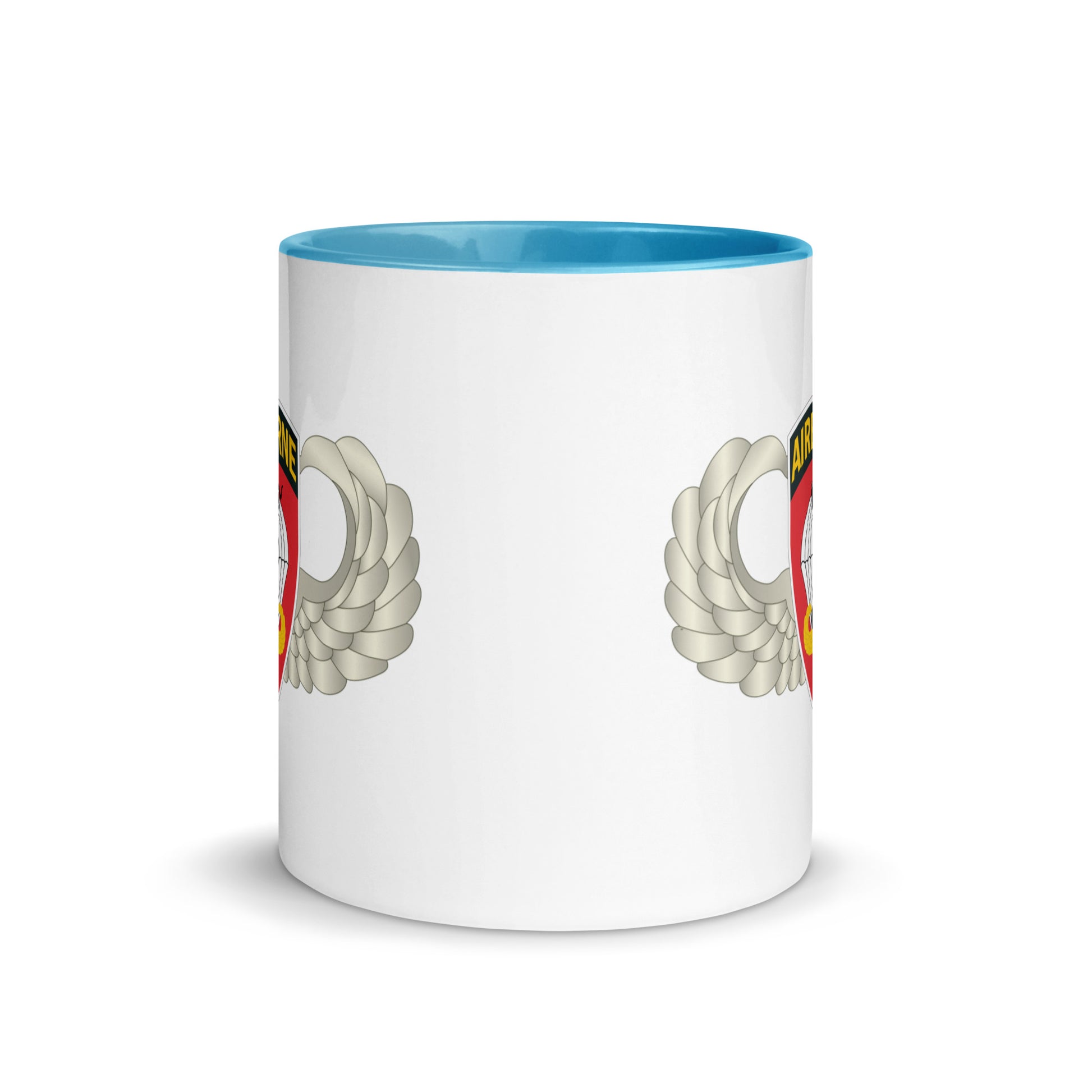  "Ceramic mug with blue interior featuring 555th Parachute Infantry Battalion SSI, center view"