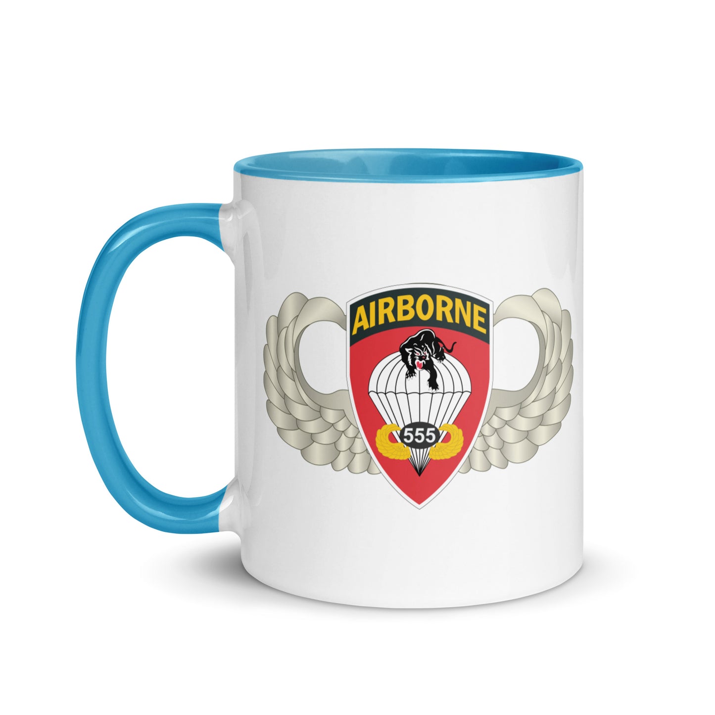  "Ceramic mug with blue interior featuring 555th Parachute Infantry Battalion SSI, front view"