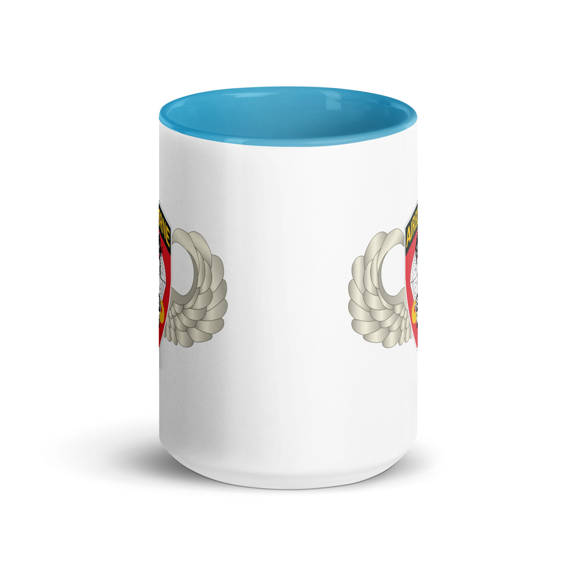  "Ceramic mug with blue interior featuring 555th Parachute Infantry Battalion SSI, center view"