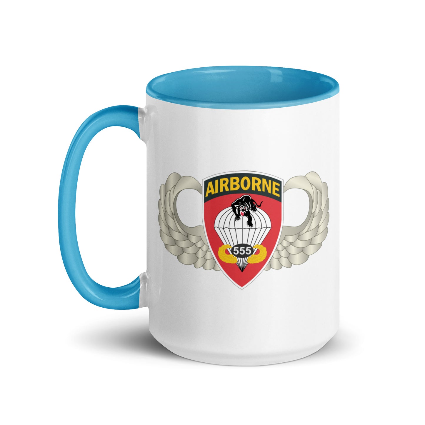  "Ceramic mug with blue interior featuring 555th Parachute Infantry Battalion SSI, front view"