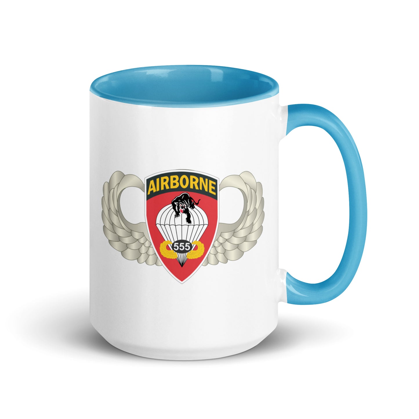  "Ceramic mug with blue interior featuring 555th Parachute Infantry Battalion SSI, rear view"
