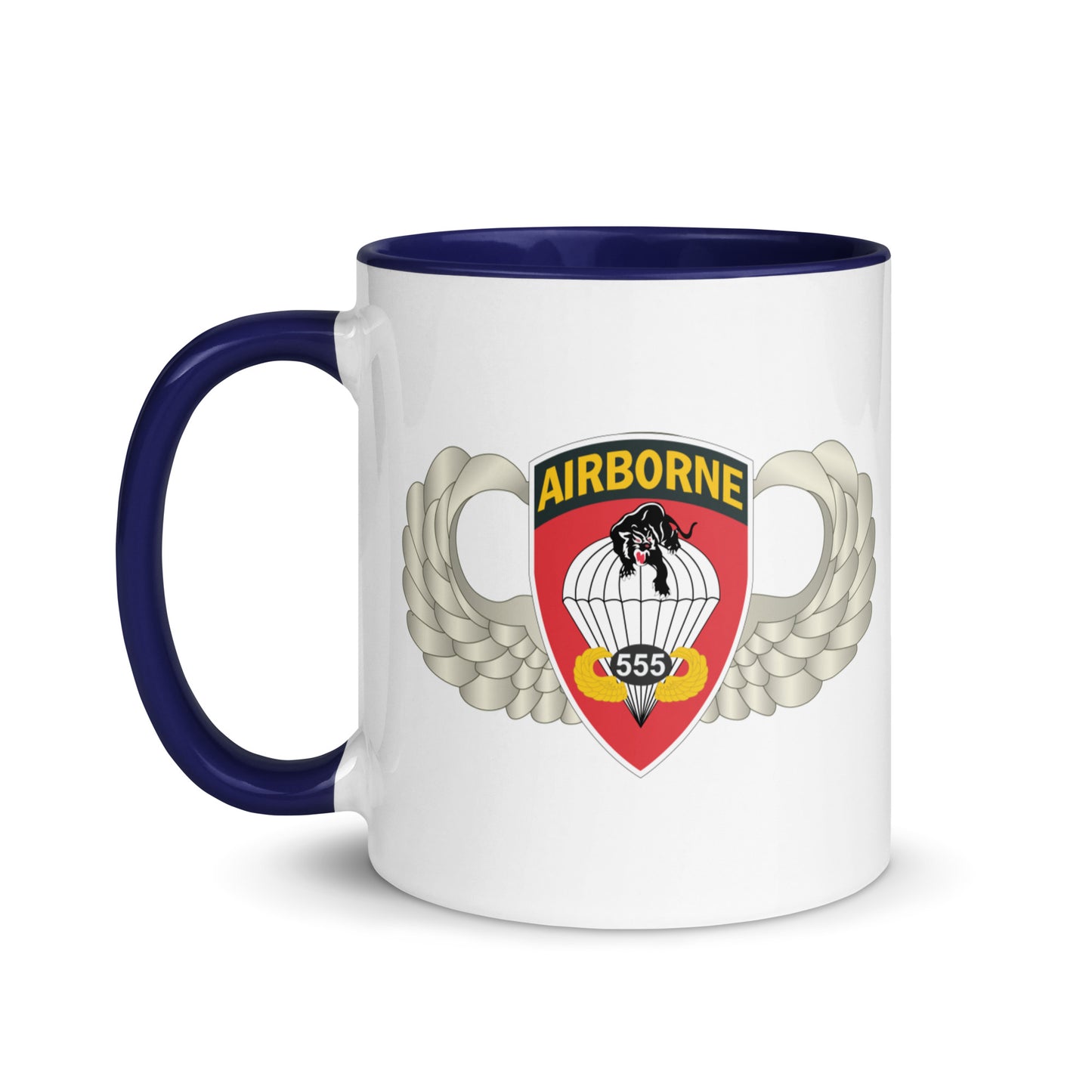  "Ceramic mug with dark blue interior featuring 555th Parachute Infantry Battalion SSI, front view"