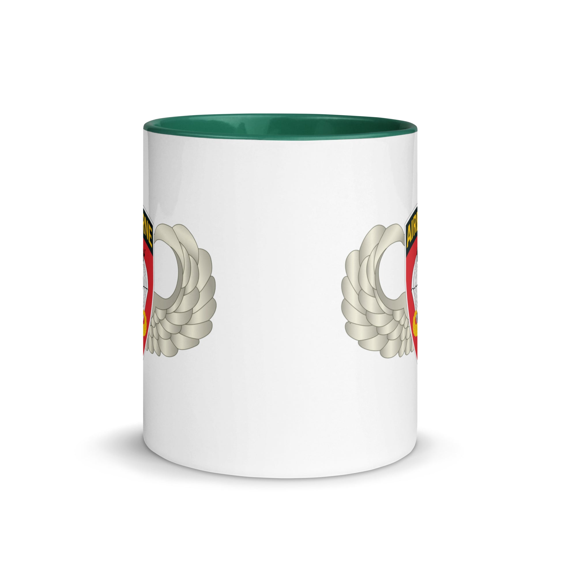  "Ceramic mug with dark green interior featuring 555th Parachute Infantry Battalion SSI, center view"