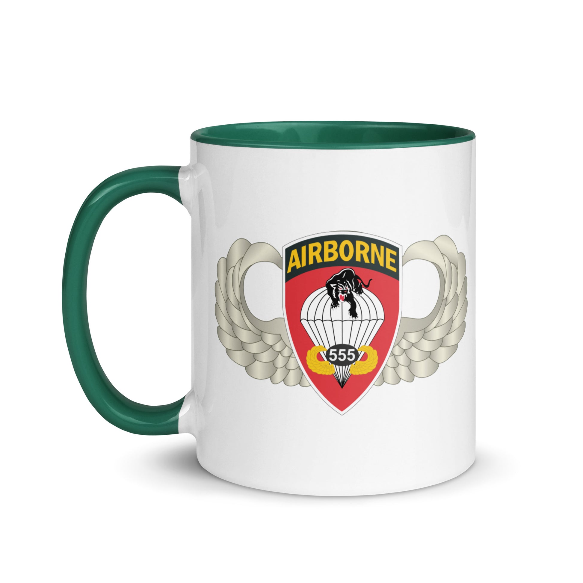  "Ceramic mug with dark green interior featuring 555th Parachute Infantry Battalion SSI, front view"