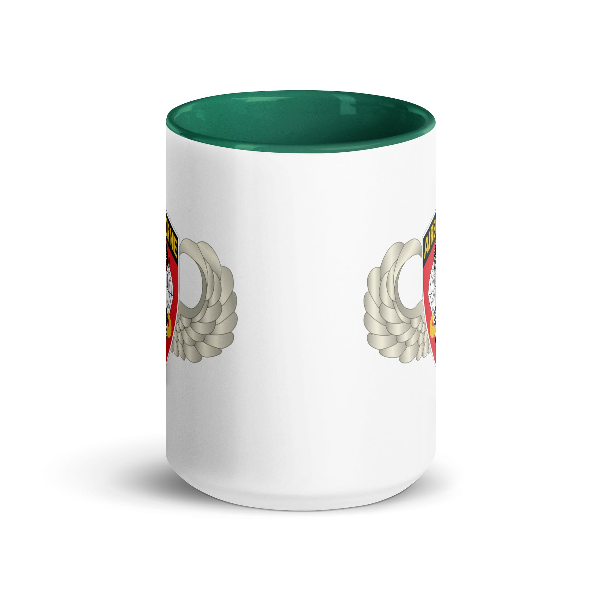  "Ceramic mug with dark green interior featuring 555th Parachute Infantry Battalion SSI, center view"