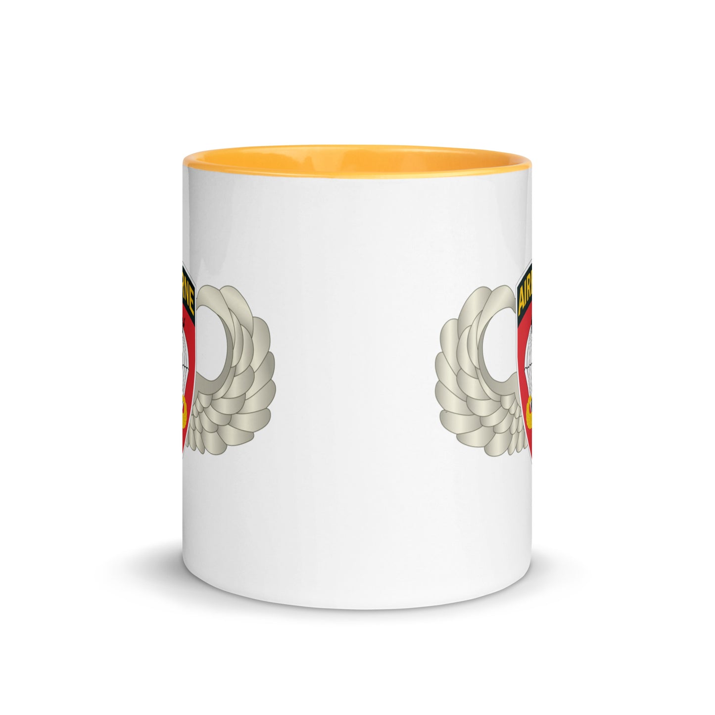  "Ceramic mug with golden yellow interior featuring 555th Parachute Infantry Battalion SSI, center view"