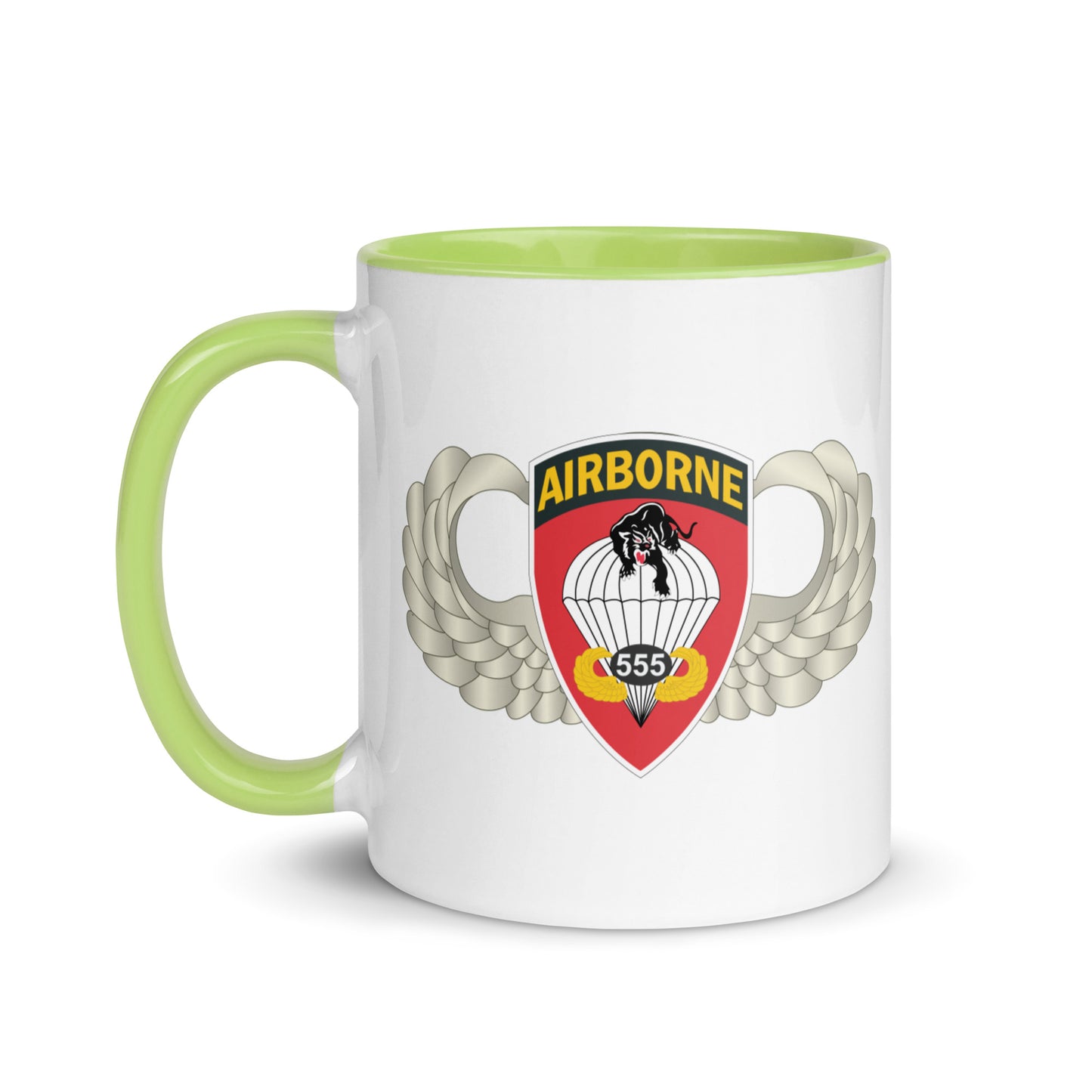  "Ceramic mug with green interior featuring 555th Parachute Infantry Battalion SSI, front view"
