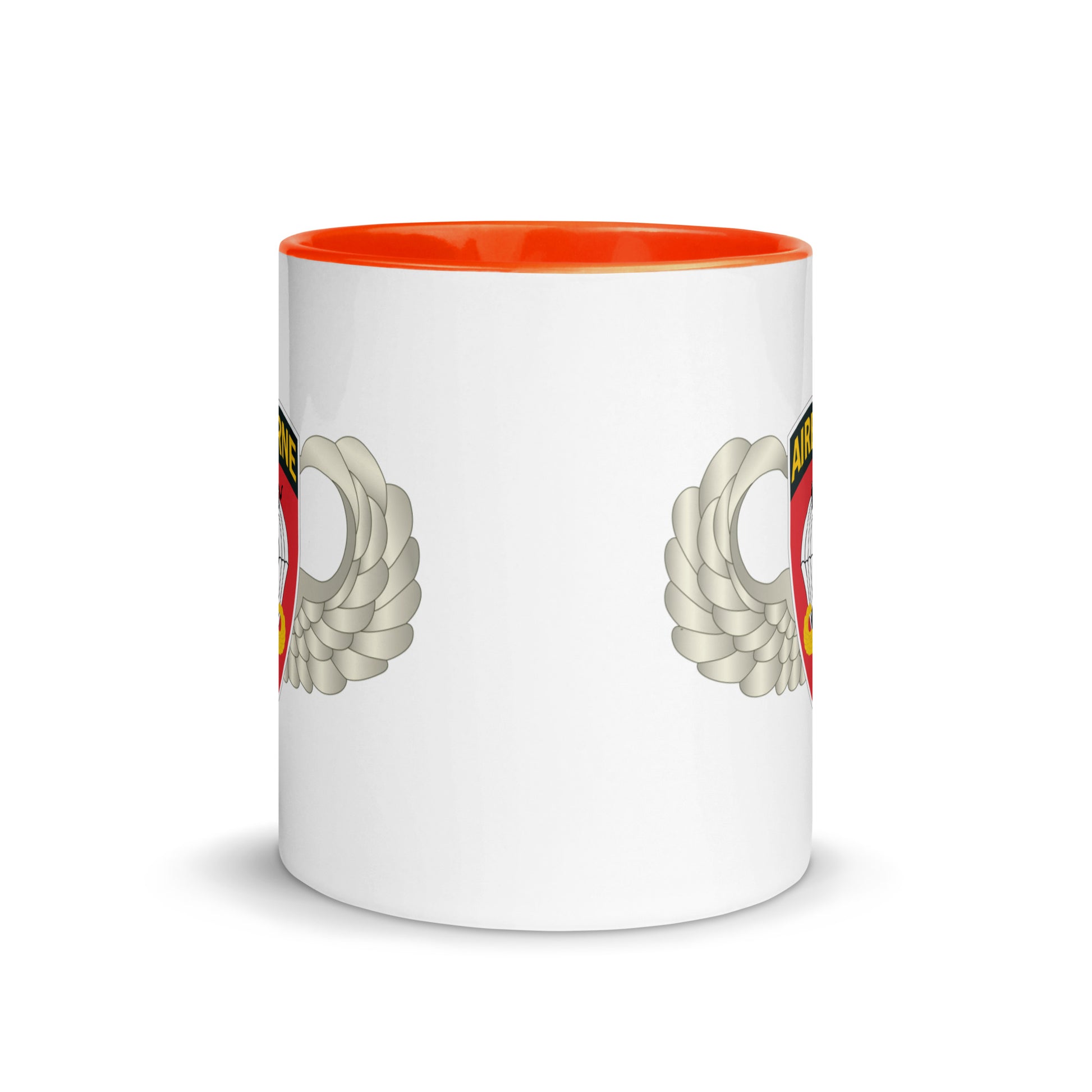  "Ceramic mug with orange interior featuring 555th Parachute Infantry Battalion SSI, center view"