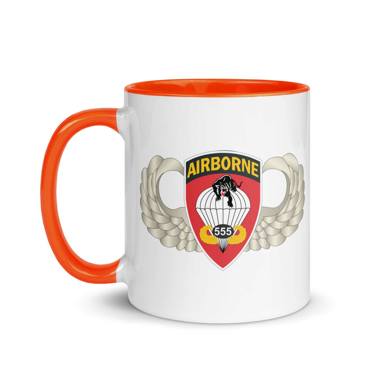  "Ceramic mug with orange interior featuring 555th Parachute Infantry Battalion SSI, front view"