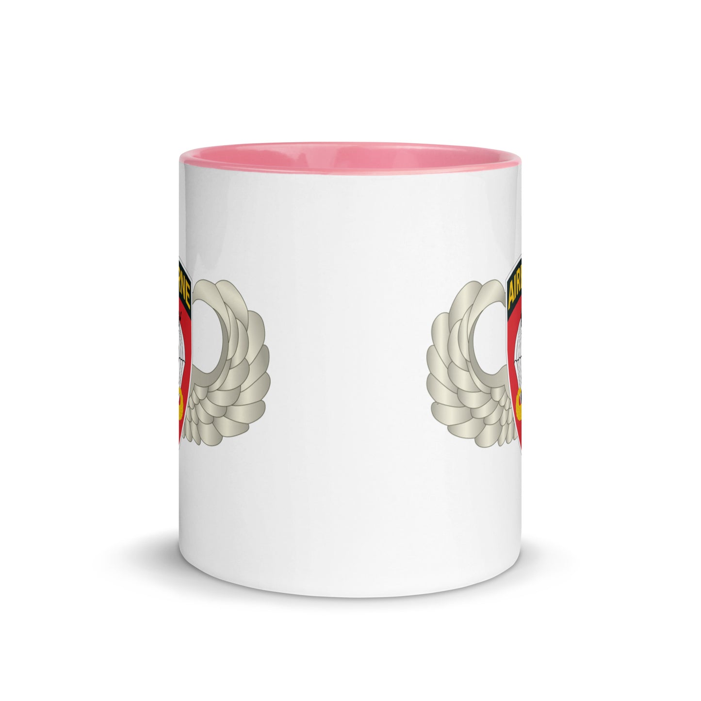  "Ceramic mug with pink interior featuring 555th Parachute Infantry Battalion SSI, center view"