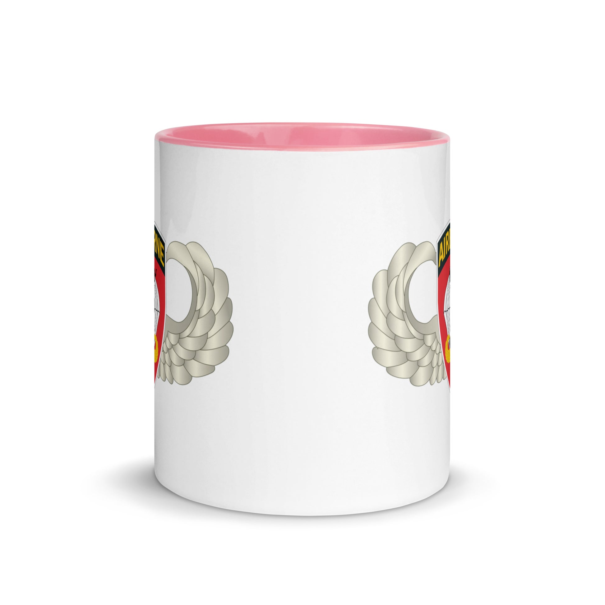  "Ceramic mug with pink interior featuring 555th Parachute Infantry Battalion SSI, center view"