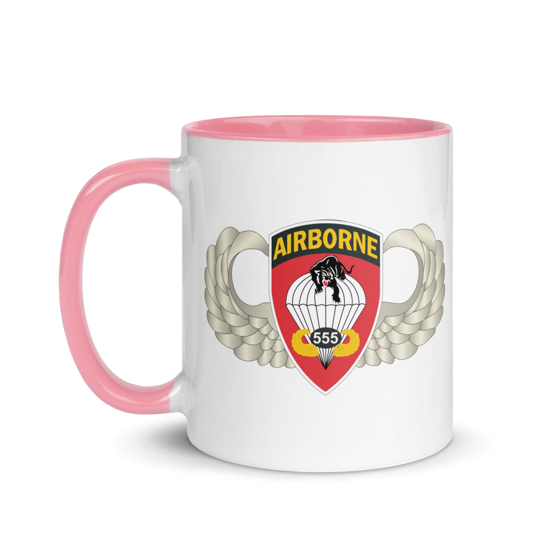  "Ceramic mug with pink interior featuring 555th Parachute Infantry Battalion SSI, front view"