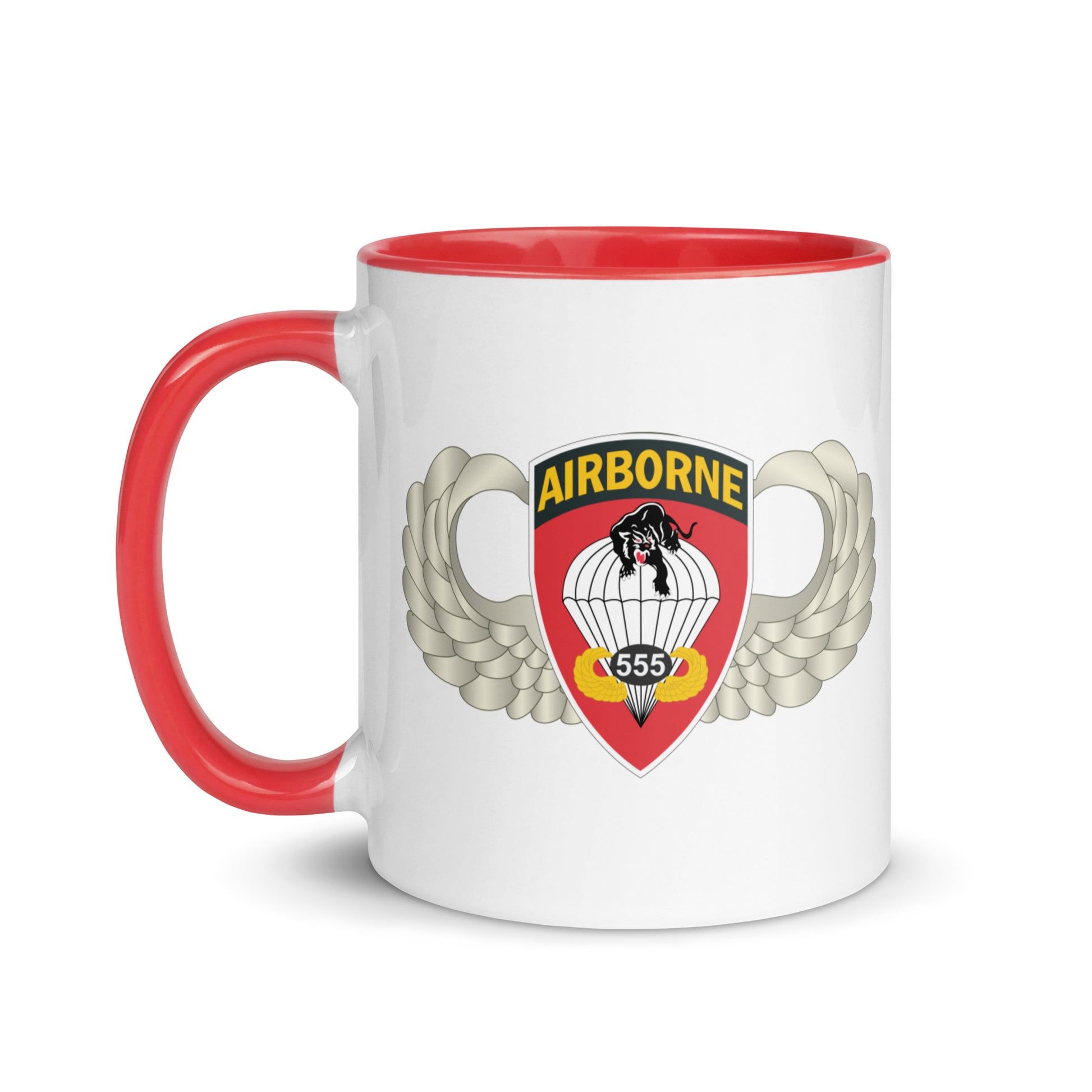  "Ceramic mug with red interior featuring 555th Parachute Infantry Battalion SSI, front view"