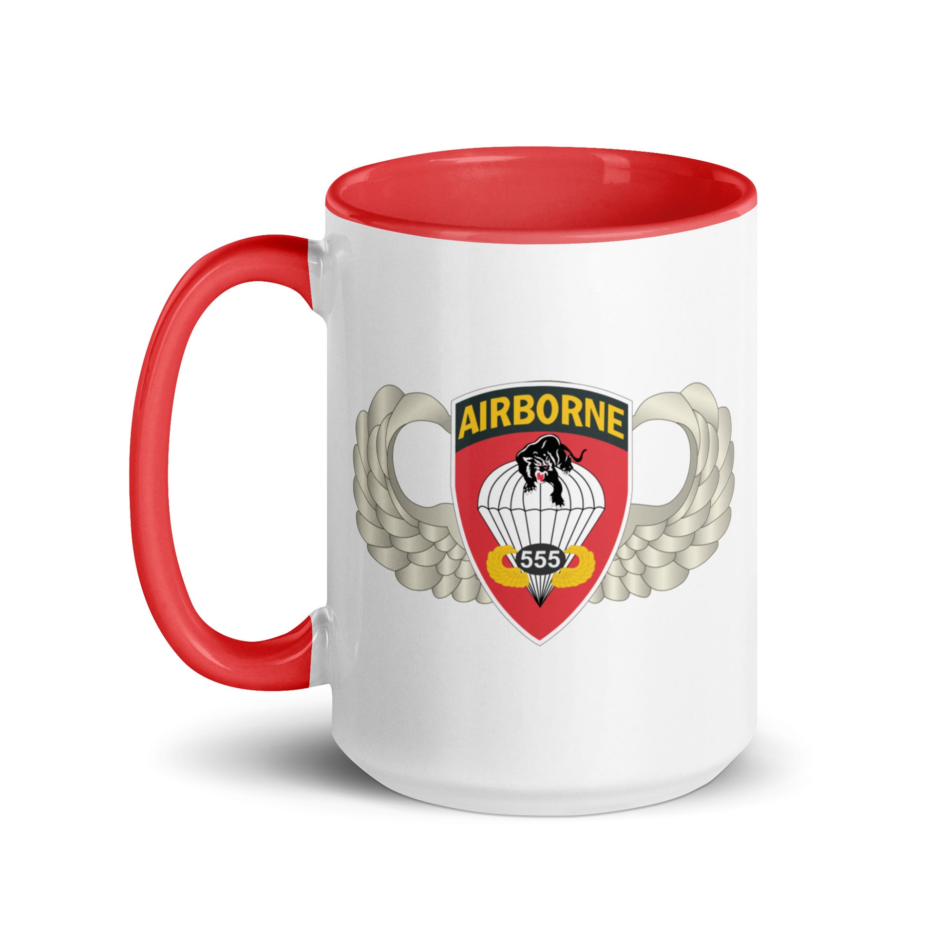  "Ceramic mug with red interior featuring 555th Parachute Infantry Battalion SSI, front view"