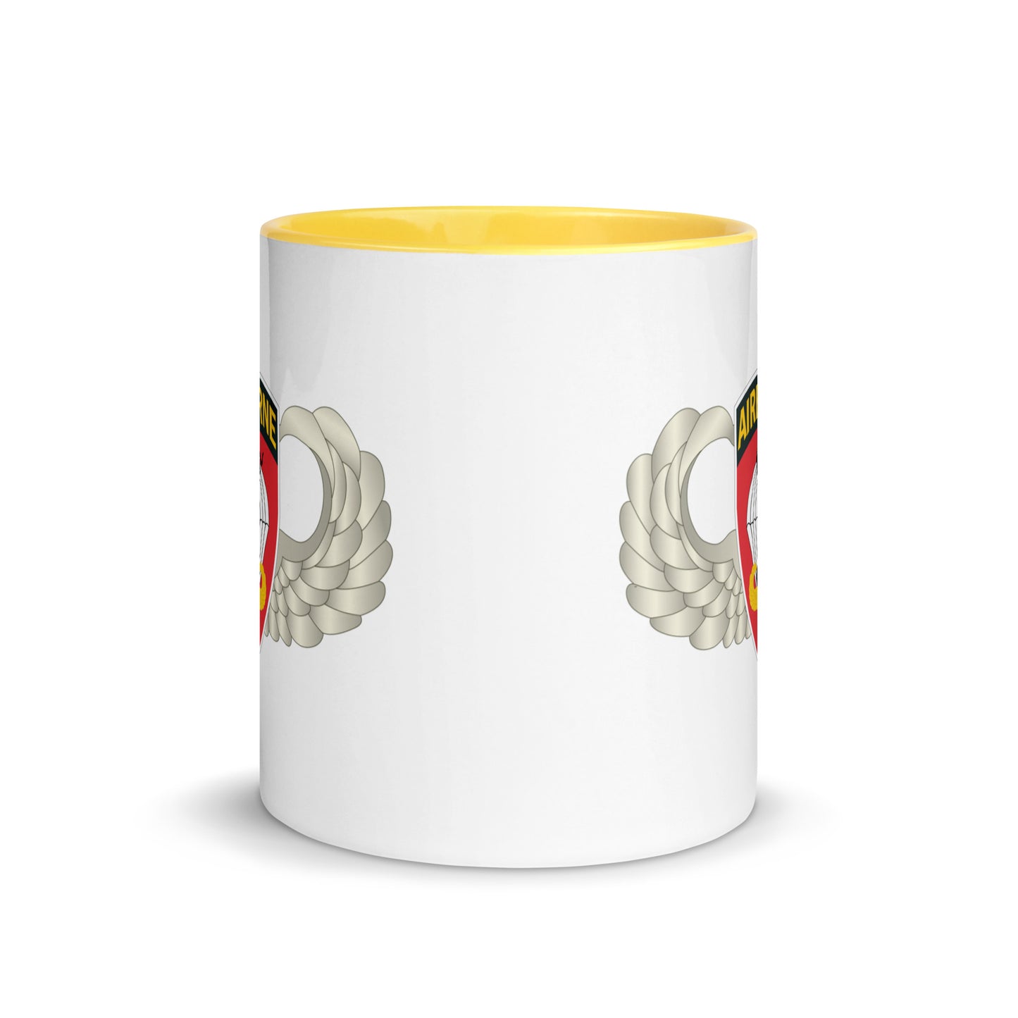  "Ceramic mug with yellow interior featuring 555th Parachute Infantry Battalion SSI, center view"