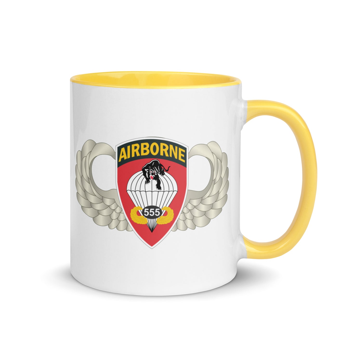  "Ceramic mug with yellow interior featuring 555th Parachute Infantry Battalion SSI, rear view"